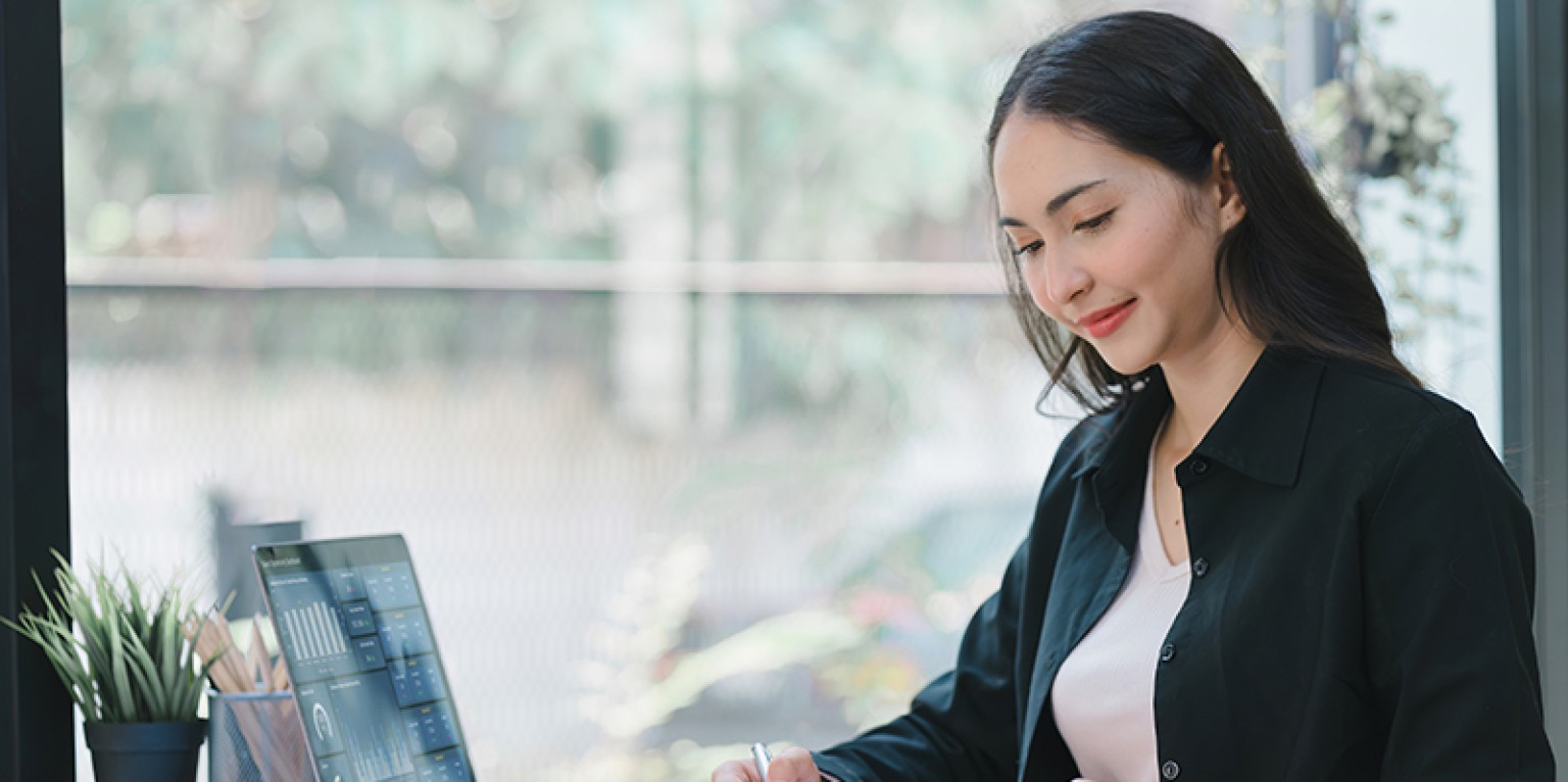 a woman working at a computer