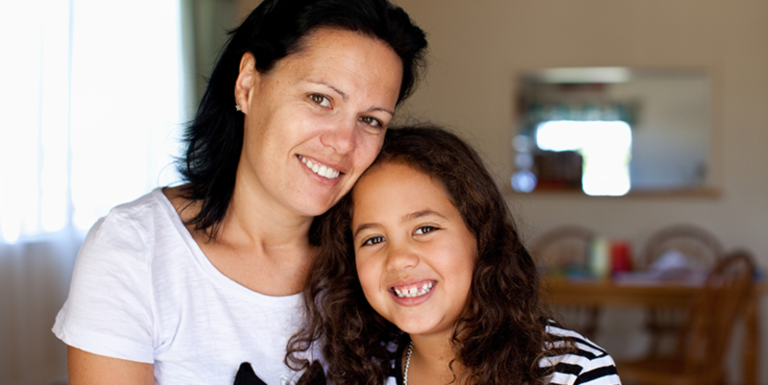 mum and daughter embracing