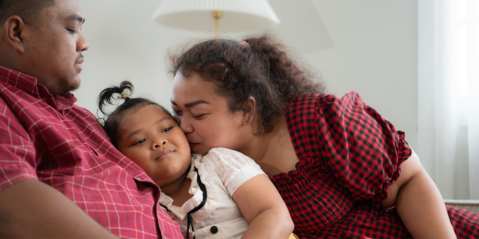 photo of family embracing